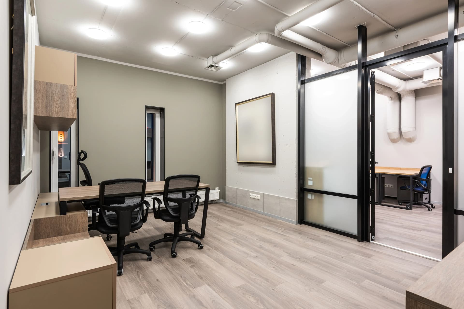 Basic mechanical and electrical services being installed in a UK commercial Cat A fit-out