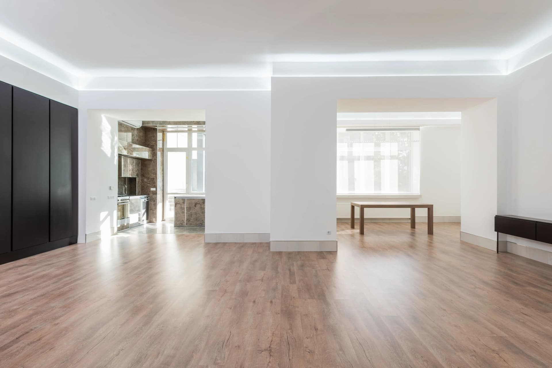 Internal surface finishing work, including wall painting and ceiling decoration, in a UK commercial fit-out.