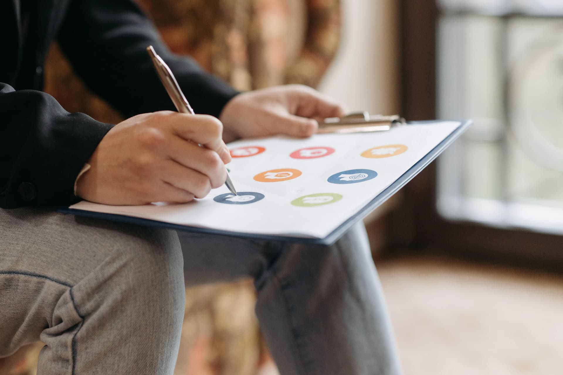Worker completing paperwork for a compartmentation survey