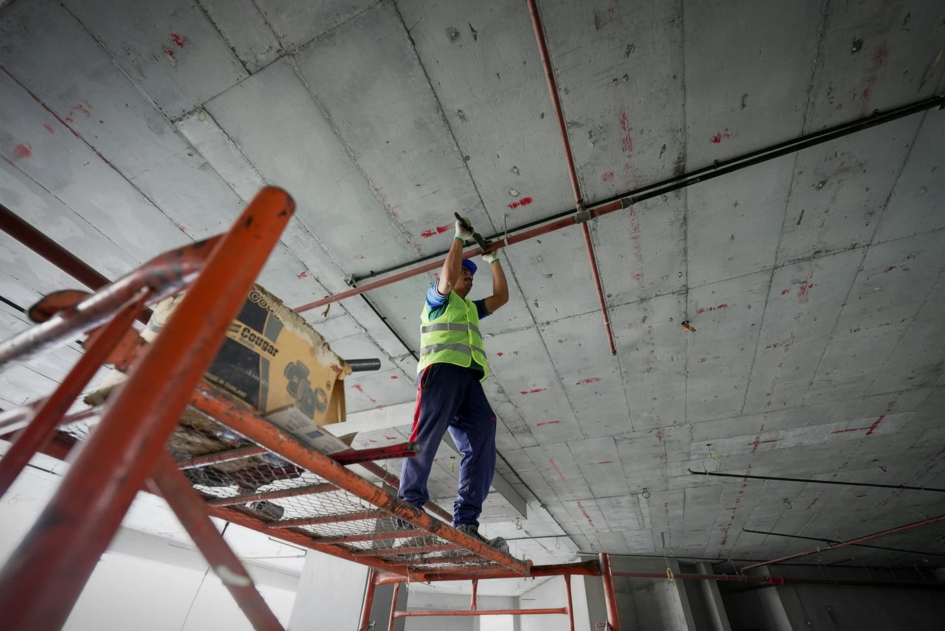 Engineer carrying out planned preventive maintenance on commercial building services systems