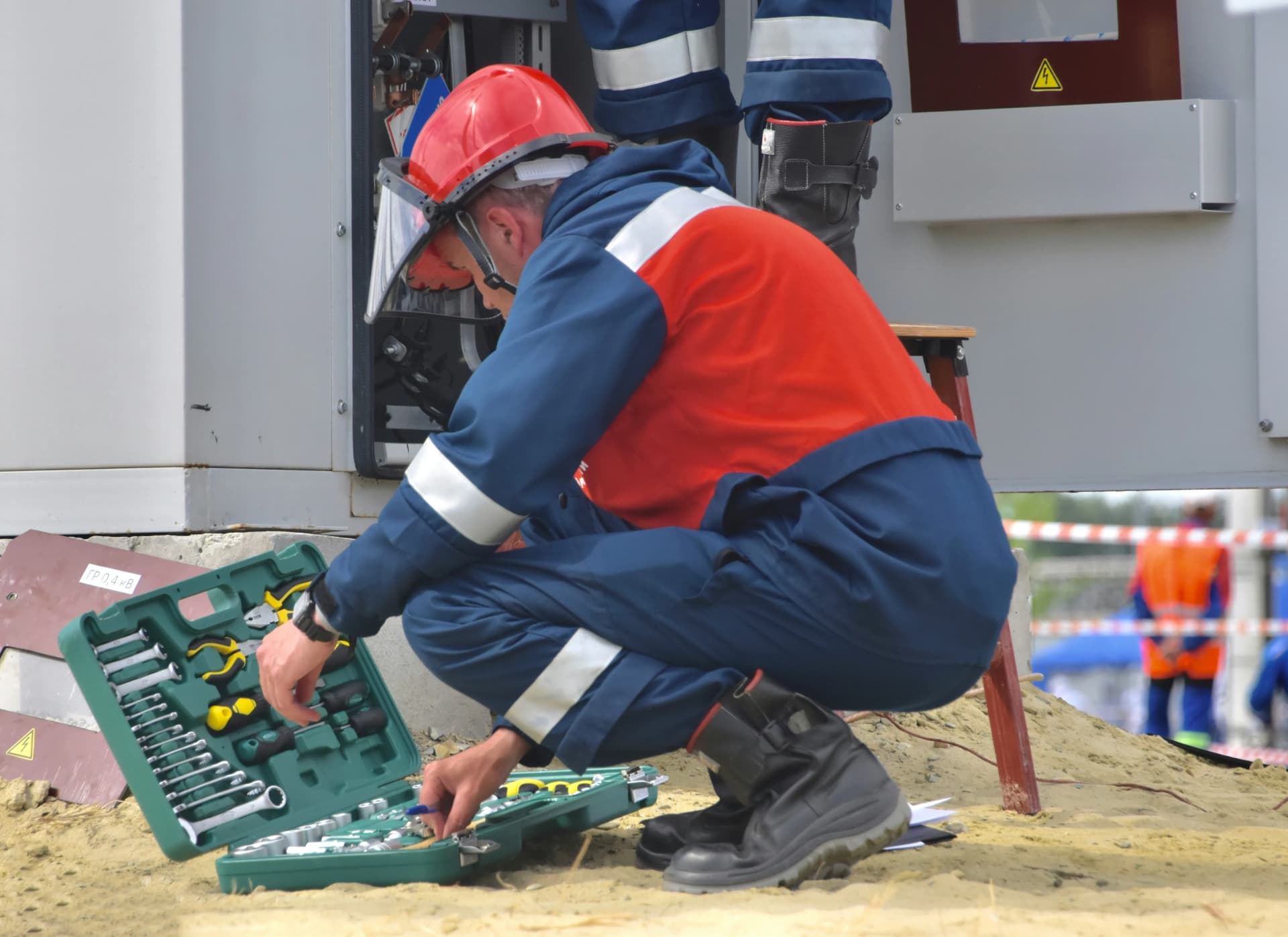 Engineer carrying out planned preventive maintenance on electrical equipment