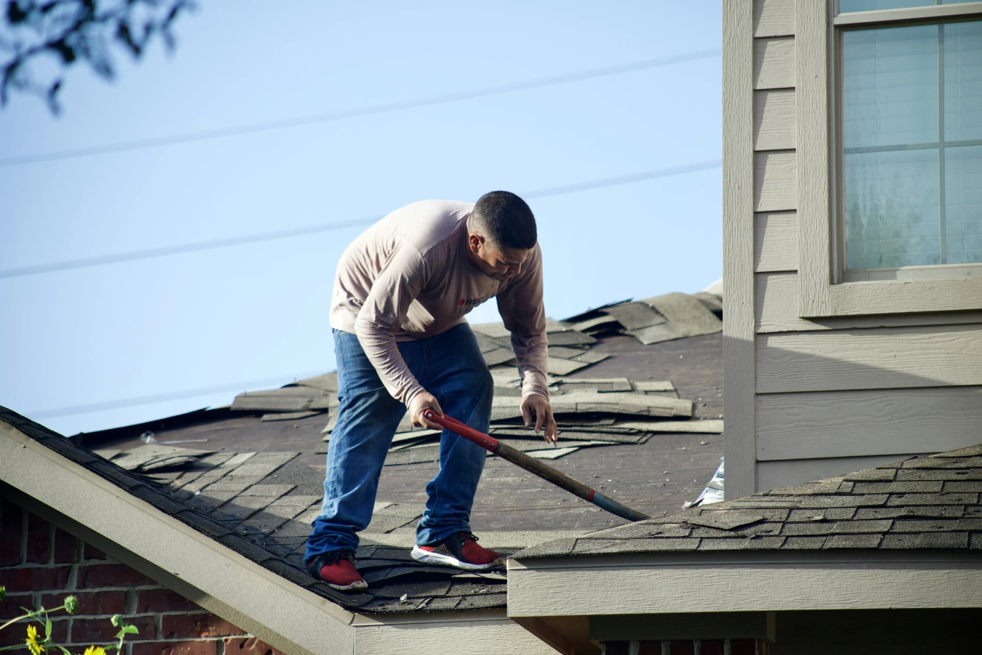 Specialist clearing and maintaining roof drainage systems to support effective water flow
