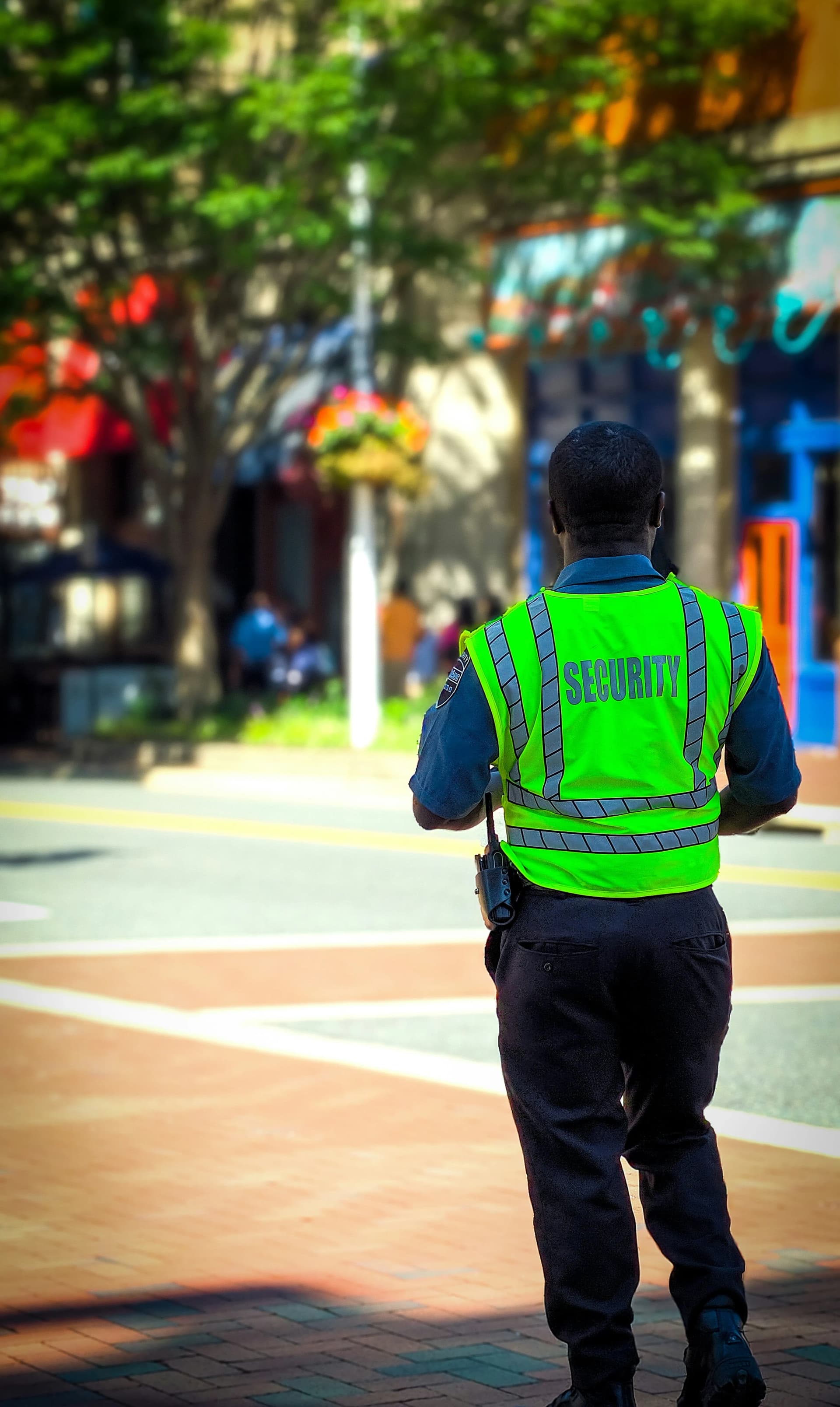 Securak manned security guard in high-visibility workwear